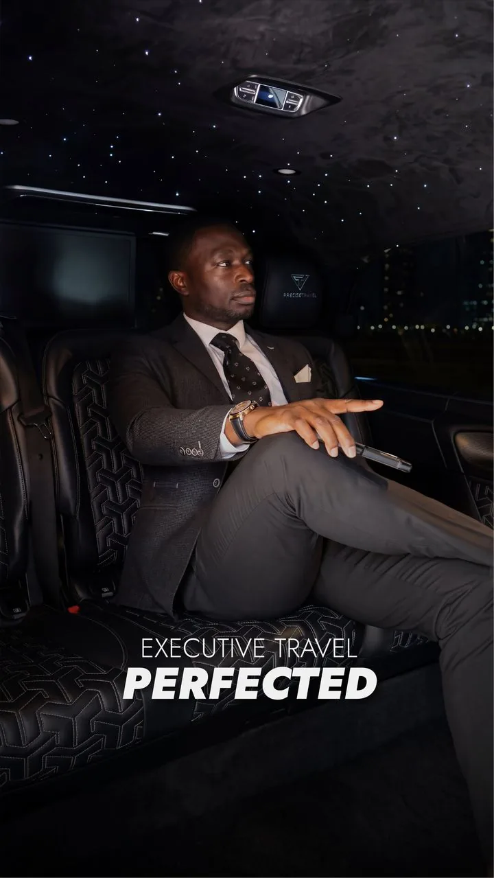 Businessman seated in the executive rear cabin