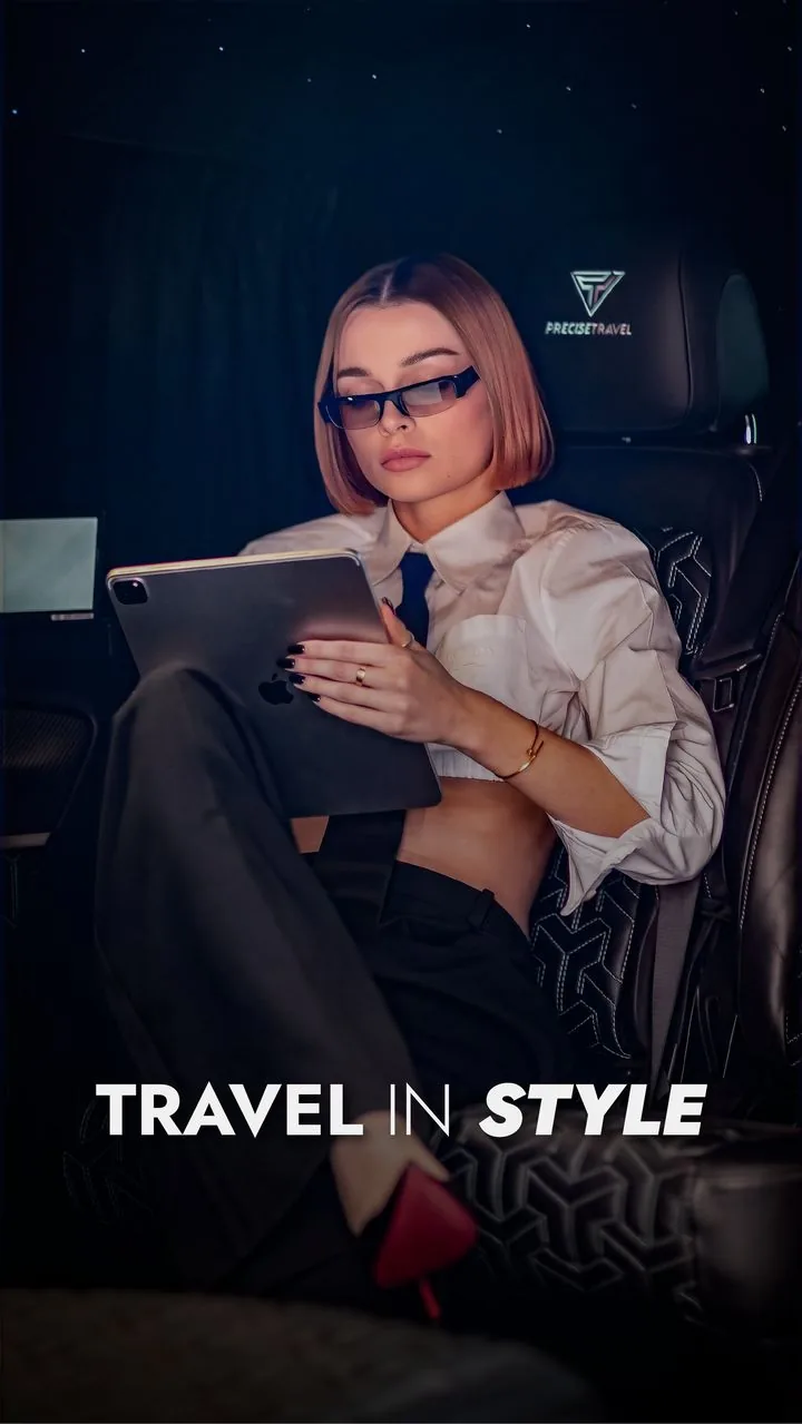 Client relaxing with a tablet beside branded headrest